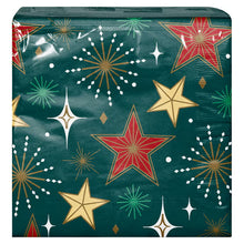 Paper napkin patterned with red and gold stars and decorative bursts