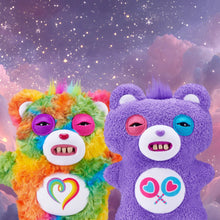 Pair of fuzzy monster plush toys: rainbow and purple, each with heart chest signs
