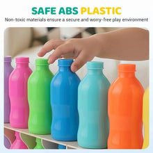 Set of colorful ABS plastic bottles in pink, green, blue, teal, and orange