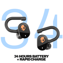 True wireless earbuds, black with orange skull logo, stems and ear hooks shown.