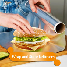 Aluminum foil sheet wrapping sandwiches and deli food on a kitchen board
