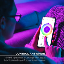 Smart LED bulb app on smartphone controlling multicolor lighting