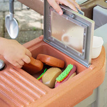Kids grill play center tray with orange cooking molds and small toy items