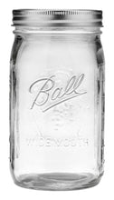 Clear wide-mouth mason jar with metal lid ring and Ball® logo on the glass