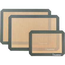 Gray silicone baking mat set of 3 with textured surface and dark gray borders.
