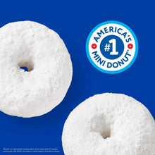 Powdered mini donuts with central holes and America’s #1 mini donut badge