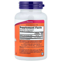 Supplement facts panel on orange label for veg capsule bottle, blue cap