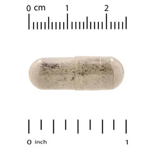 Beige softgel capsule shown for size comparison on a measurement scale