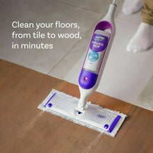 Swiffer Power Mop with refill solution bottle on a floor cleaning pad