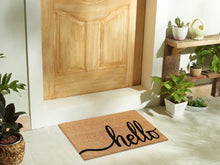 Tan coir doormat with black 'hello' script