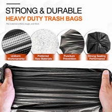 Black heavy-duty trash bag shown folded wide, held by two hands