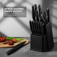 Space-saving black knife block holding multiple knives with storage slots