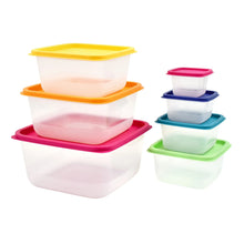 Stacked plastic food storage containers, assorted colored lids and white bases
