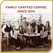 Family portrait with coffee sacks and Don Francisco’s branding, since 1870.