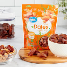 Great Value pitted Deglet Noor dates pouches with dried dates in bowls