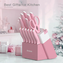 Pink kitchen knife set in block with multiple stainless blades and matching handles