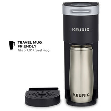 Black Keurig K-Mini single serve coffee maker with stainless travel mug