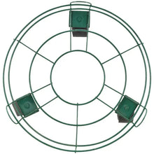 Green metal plant caddy with circular wire frame and handle loops, no wheels visible