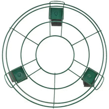 Green metal plant caddy with circular wire frame and foldable handles