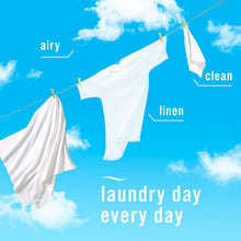 Air freshener spray concept with white clothes on a laundry line
