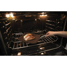 Square griddle pan with food heating in an oven
