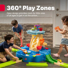 360° water play activity center with blue base, green rails, and top spinning parts