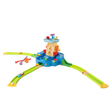 Blue water play activity center with green slide tracks and colorful accessories