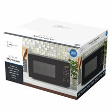 Mainstays boxed countertop microwave oven in black with 0.7 cu ft info