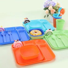 Plastic kids dinnerware set with blue, orange, and green trays plus cups and forks
