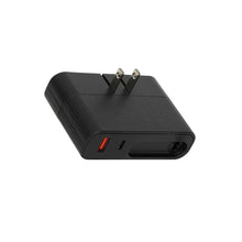 Black dual-port wall charger with two-pin plug and charging ports