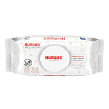 Huggies Skin Essentials baby wipes pack with flip-top lid and 99% water label