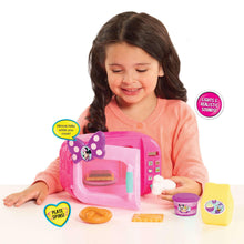 Pink Minnie microwave toy with pretend foods and cups, child at play