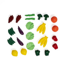Assorted toy food pieces: berries, lettuce, bananas, and fruit in mixed colors