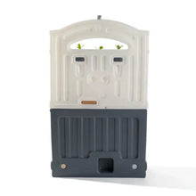 Toy play kitchen set front with sink, arched window, and dark cabinet base