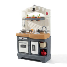 Kids' play kitchen set with oven, stove, and sink, wood-look countertop and faucet