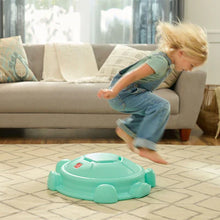 Teal turtle rocking disk stepping stone with raised edge and base