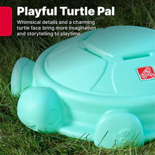 Teal turtle rocking disk with turtle head detail and sculpted grooves
