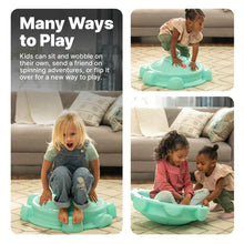 Teal turtle rocking disk with contoured seat and molded base for play