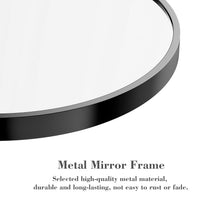 Round mirror frame edge close-up with black finish and metallic trim along perimeter