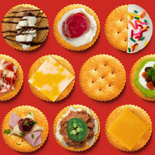 Assorted cracker appetizers with toppings, spreads, and garnishes