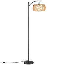Black standing arc floor lamp with woven rattan drum shade