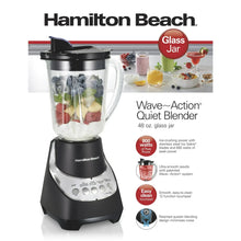 Black blender with glass jar and lid, featuring control buttons and dial