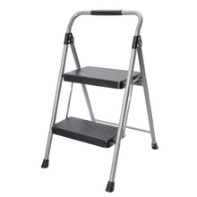 Two-step foldable step stool with gray metal frame and black top and lower platforms