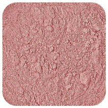 Organic red superfoods powder, fine textured pink-red powder surface