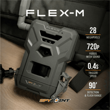 Close-up of gray trail camera front with lens window and sensor openings
