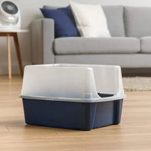 Navy open top cat litter box with white shield, set on floor