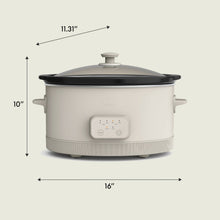 Oatmilk digital slow cooker with black lid and side handles, bella