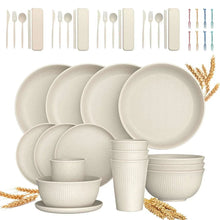 Wheat straw dinnerware set with beige plates, bowls, cups, and matching cutlery pieces