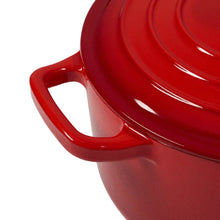 Carote red enamel cast iron dutch oven side handle and lid edge detail