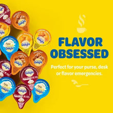 Coffee creamer singles heart-shaped display with assorted International Delight packets